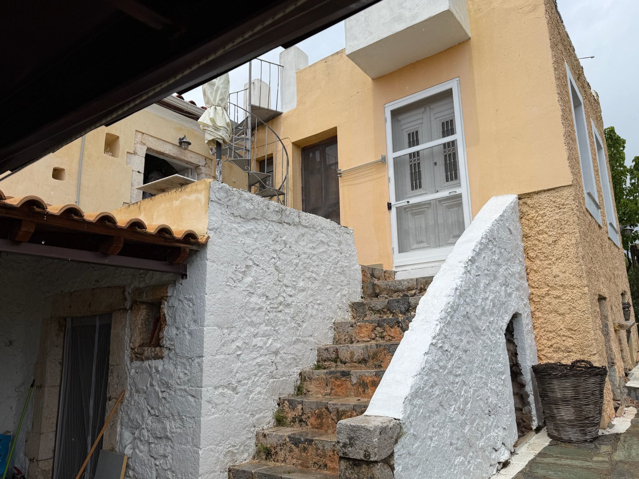 Stone steps leading to the upper floor of the mansion