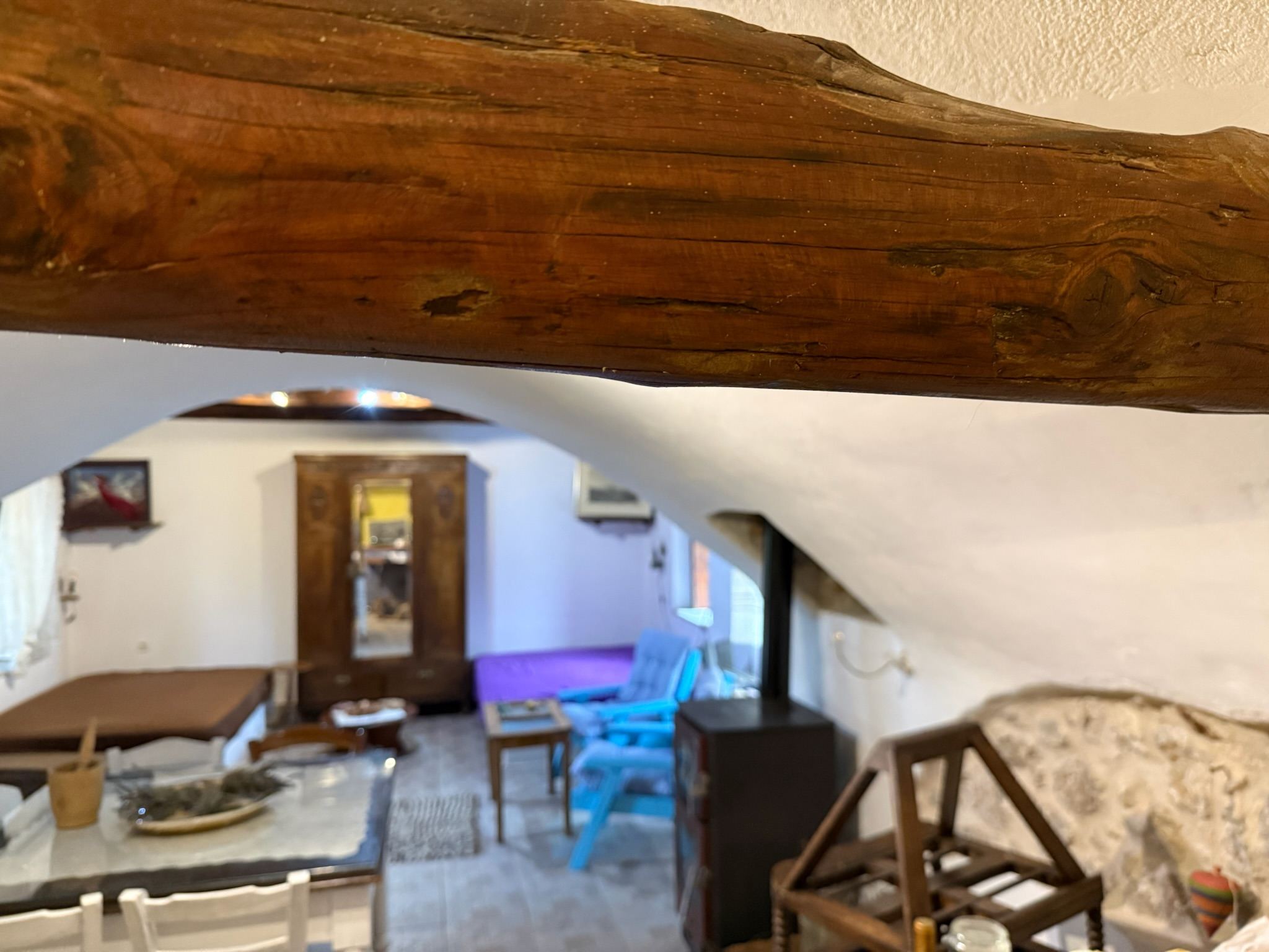 Timber beam following the curve of the vault
