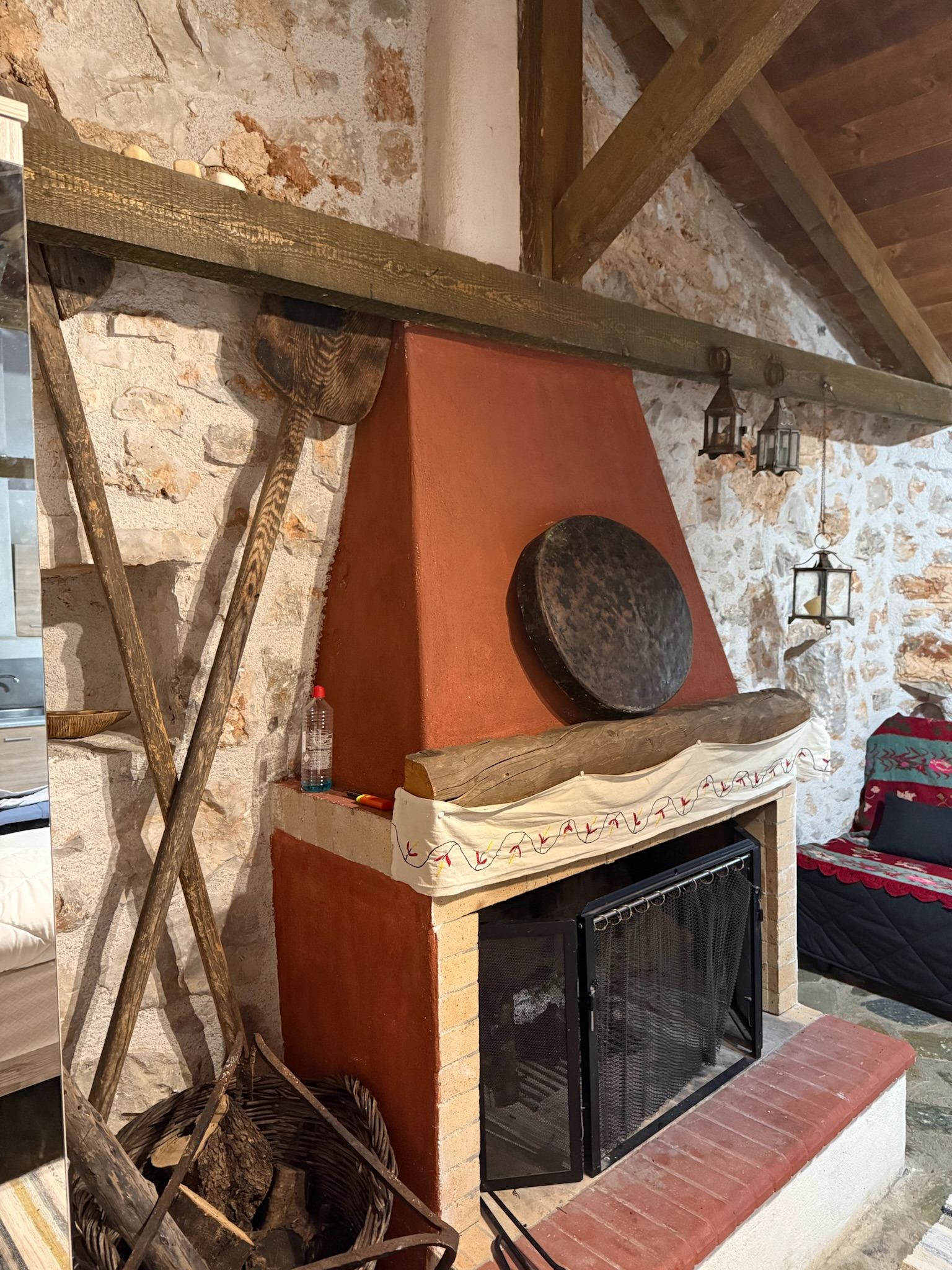 Hand-finished fireplace and original timber frame