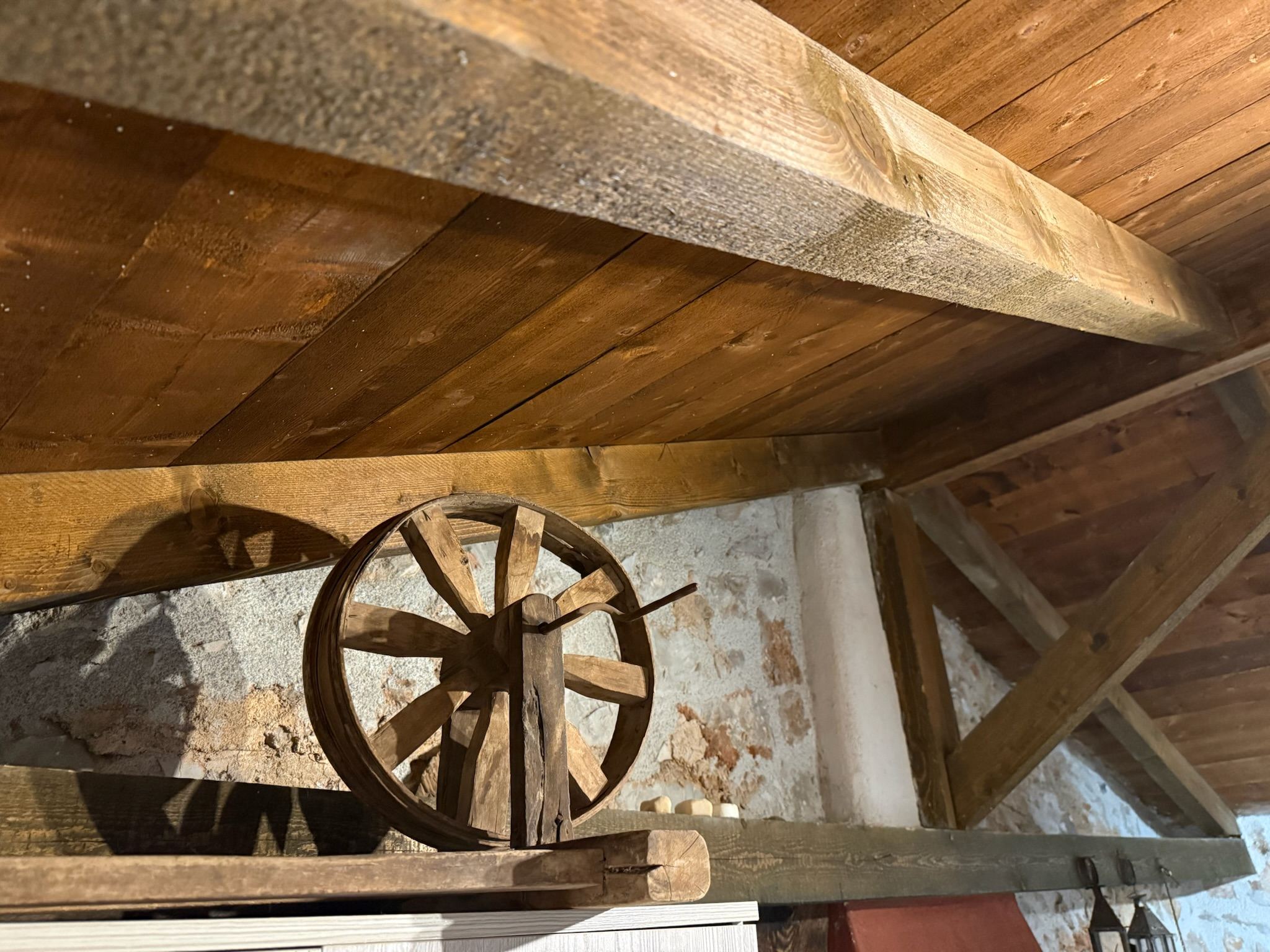 Wheel detail beneath the timber roof