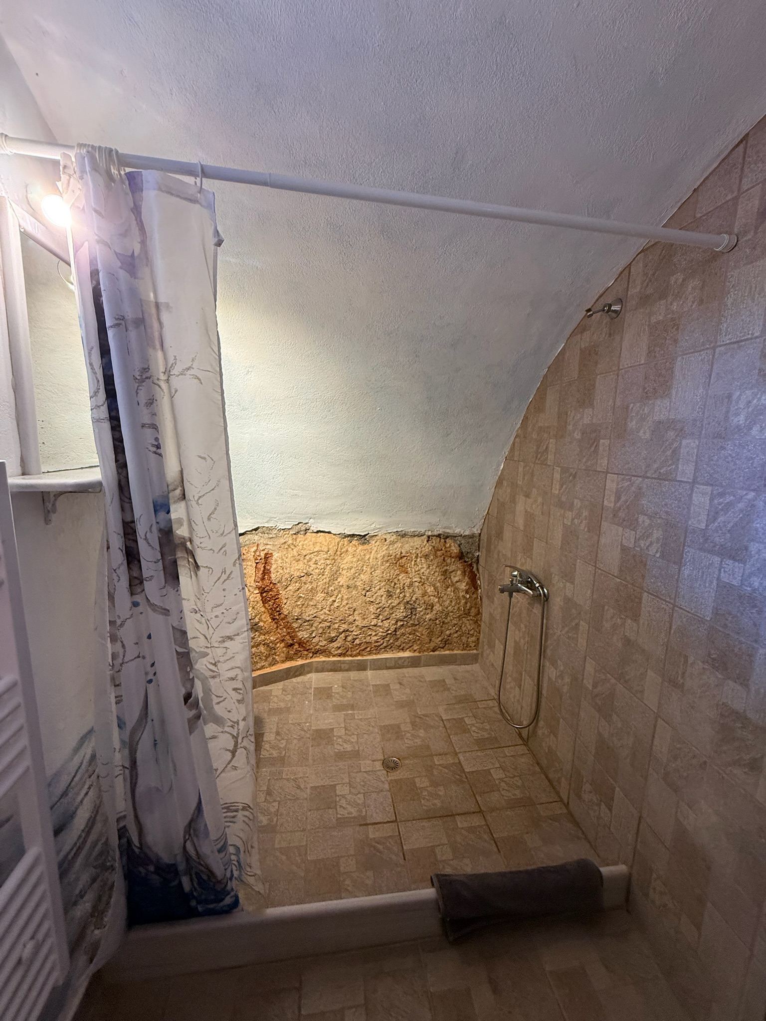 Stone preserved inside the shower