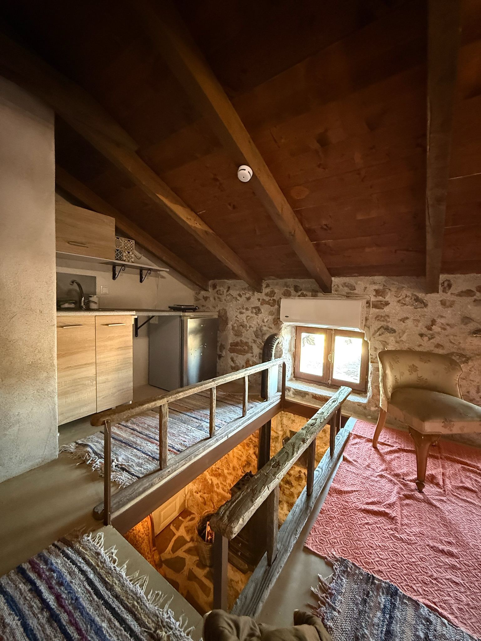 Timber gallery above the ground-floor room